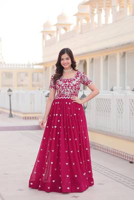 Sophesticated pink colour ethnic rich looks gown for party looks 1