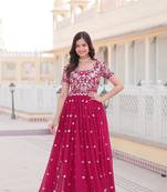 Sophesticated pink colour ethnic rich looks gown for party looks