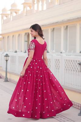 Sophesticated pink colour ethnic rich looks gown for party looks 3