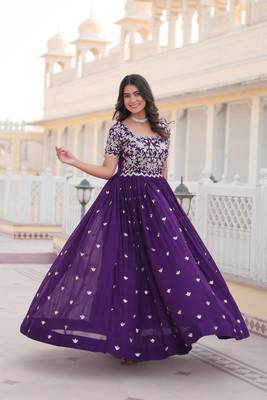 Sophesticated purple colour ethnic rich looks gown for party looks 1