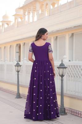Sophesticated purple colour ethnic rich looks gown for party looks 3