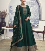 Dark green reshamkari embroidery wedding anarkali suit