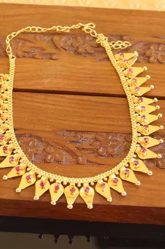 Kerala style gold plated thalikottam necklace
