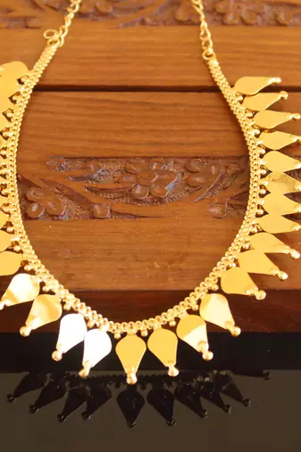 Kerala style gold plated thalikottam necklace