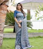 Teal woven design kanjivaram pattu silk saree with blouse