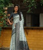 Light green woven design kanjivaram pattu silk blend saree with blouse