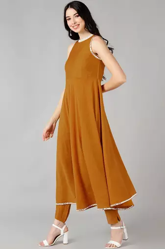 mustard color solid poly silk styles kurta trouser with dupatta