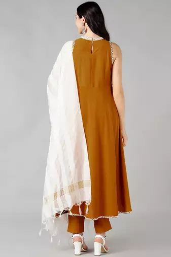 mustard color solid poly silk styles kurta trouser with dupatta