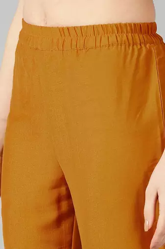 mustard color solid poly silk styles kurta trouser with dupatta
