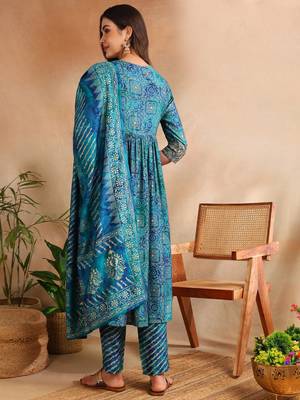 teal color printed polyester styles kurta trouser with dupatta 4