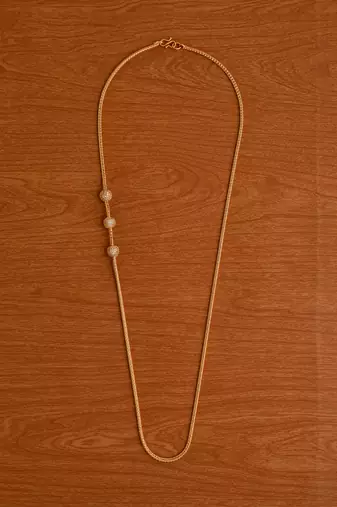 Golden mugappu necklace MEDIUM length with three white stone balls one gram gold