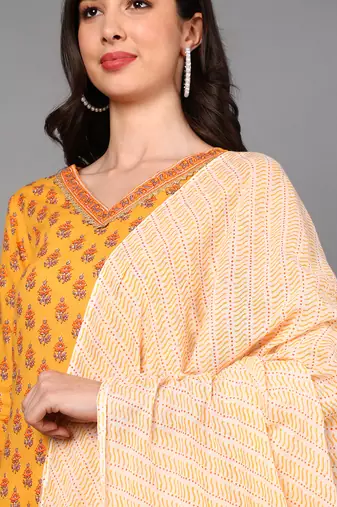 yellow color printed pure cotton styles kurta trouser with dupatta