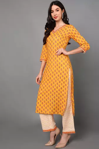 yellow color printed pure cotton styles kurta trouser with dupatta