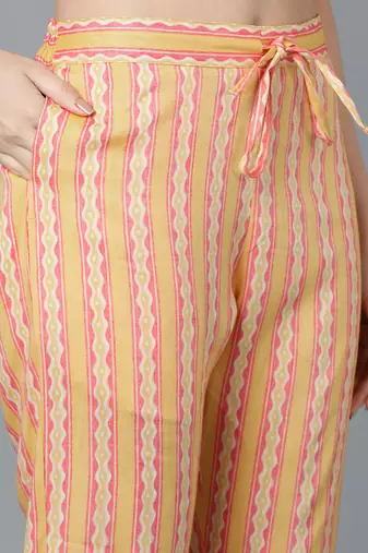yellow color printed pure cotton styles kurta trouser with dupatta