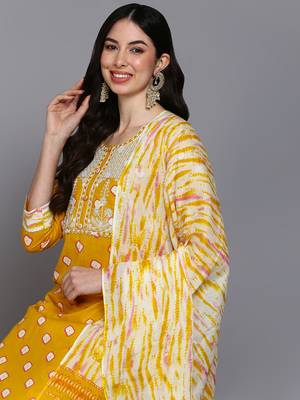 yellow color embroidered pure cotton styles kurta trouser with dupatta 2
