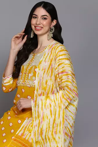 yellow color embroidered pure cotton styles kurta trouser with dupatta