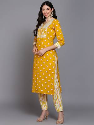 yellow color embroidered pure cotton styles kurta trouser with dupatta 3
