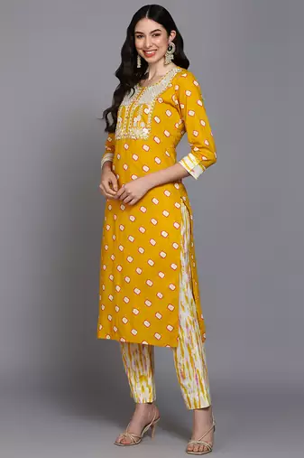 yellow color embroidered pure cotton styles kurta trouser with dupatta