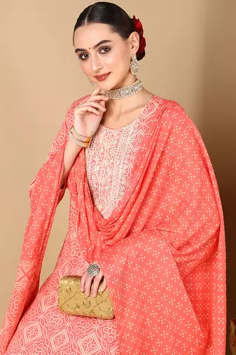 peach color embroidered pure cotton styles kurta trouser with dupatta
