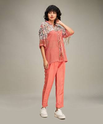 Coral conversational co ord with embellished jacket. 2