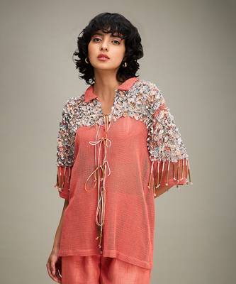 Coral conversational co ord with embellished jacket. 5