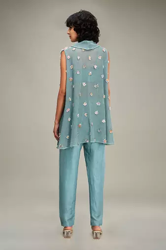 Green conversational embellished co ord set with cape