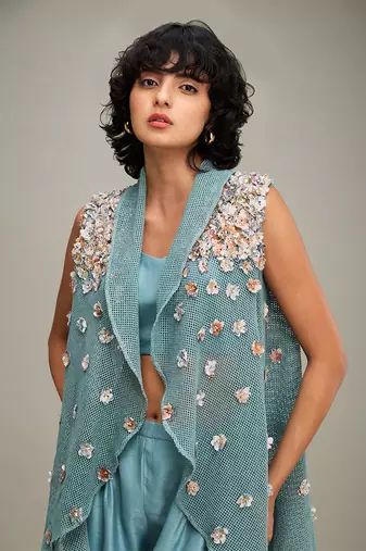 Green conversational embellished co ord set with cape