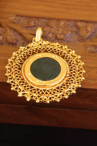 Kerala style gold plated palakka pendant