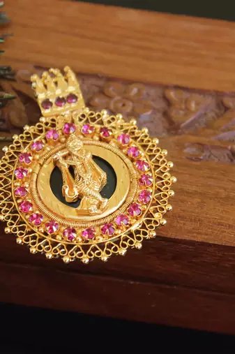 Kerala style gold plated krishna palakka ruby pendant