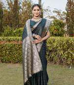 Dark green woven design kanjivaram soft satin silk blend saree with blouse