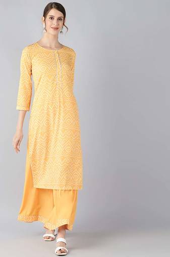 Women yellow printed poly crepe stiched straight kurta palazzo suit set