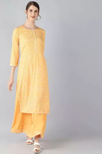 Women yellow printed poly crepe stiched straight kurta palazzo suit set