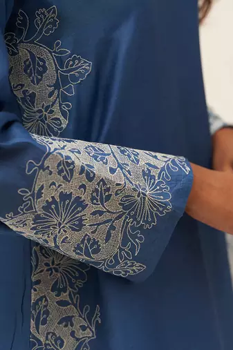 Blue and white embroidered salwar suit