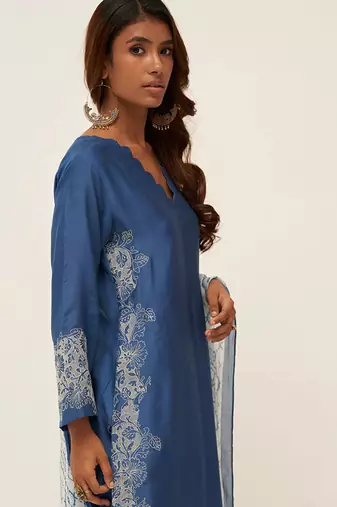 Blue and white embroidered salwar suit