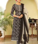 Women black printed rayon blend stiched flared kurta trousers suit set