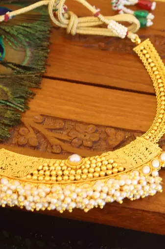 Designer gold plated pearl necklace