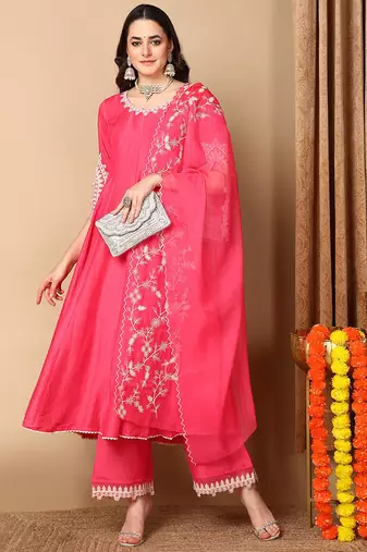 Women pink embroidered silk blend stiched flared kurta palazzo suit set