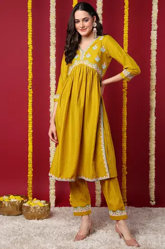 Women yellow embroidered silk blend stiched flared kurta trousers suit set