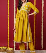Women yellow embroidered silk blend stiched flared kurta trousers suit set