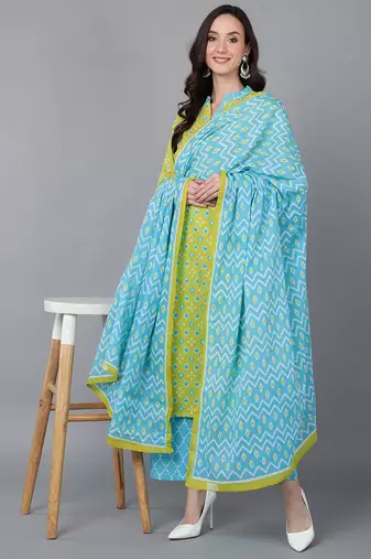 Women green printed rayon stiched flared kurta palazzo suit set