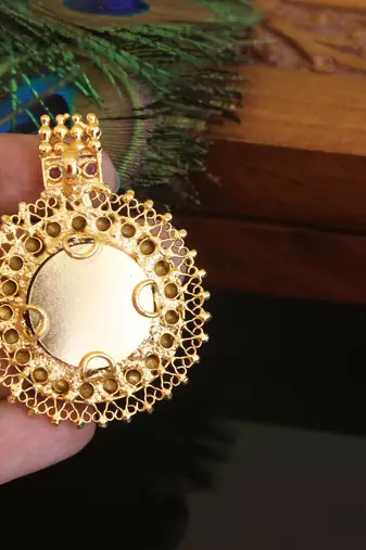 Kerala style gold plated krishna palakka pendant