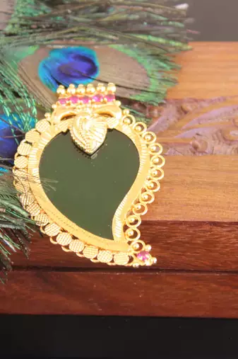 Kerala style gold plated mango palakka pendant