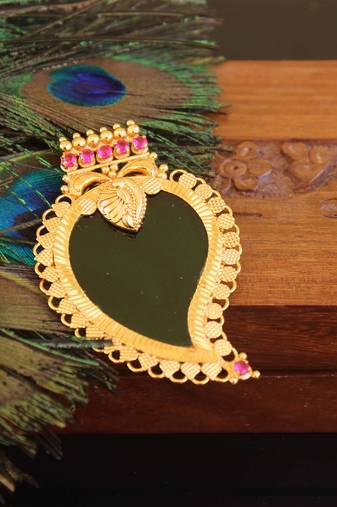 Kerala style gold plated mango palakka pendant