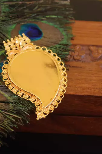 Kerala style gold plated mango palakka pendant
