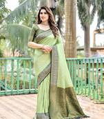 Light green woven design pure Faux kanjivaram pattu silk saree with blouse