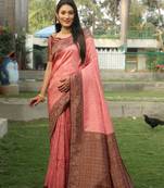 Peach woven design kanjivaram soft silk blend saree with blouse