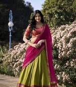 Parrot Green Kanchipuram Silk Zari Woven Lehenga with Pink Zari Blouse and Lace Georgette Dupatta