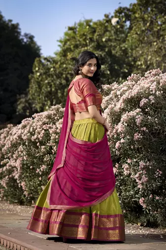 Parrot Green Kanchipuram Silk Zari Woven Lehenga with Pink Zari Blouse and Lace Georgette Dupatta
