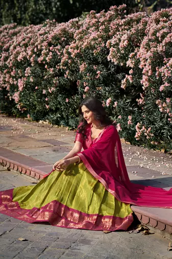 Parrot Green Kanchipuram Silk Zari Woven Lehenga with Pink Zari Blouse and Lace Georgette Dupatta