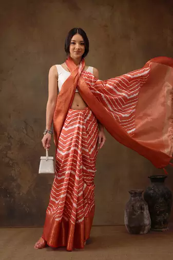 Peach Soft Silk Lahriya Printed Saree With Zari Woven Pallu